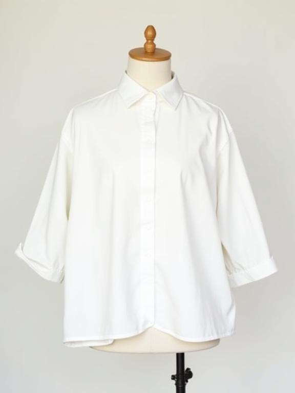 Crisp white organic cotton wide shirt.